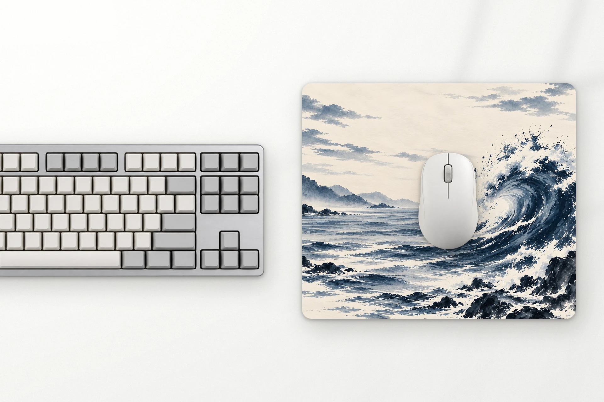 Tide L mouse pad next to the keyboard, from above