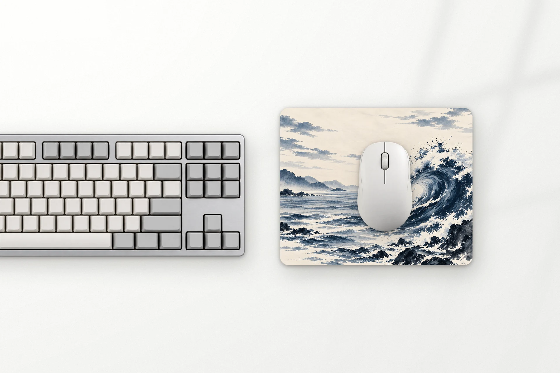 Tide S mouse pad next to the keyboard, from above